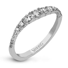 These interlocking 18k white gold band can be worn together with the rose and yellow gold bands , producing the look of one larger ring, or on their own for a simple statement. Each contains .45 ctw of shining white diamonds. Perfect for stacking.