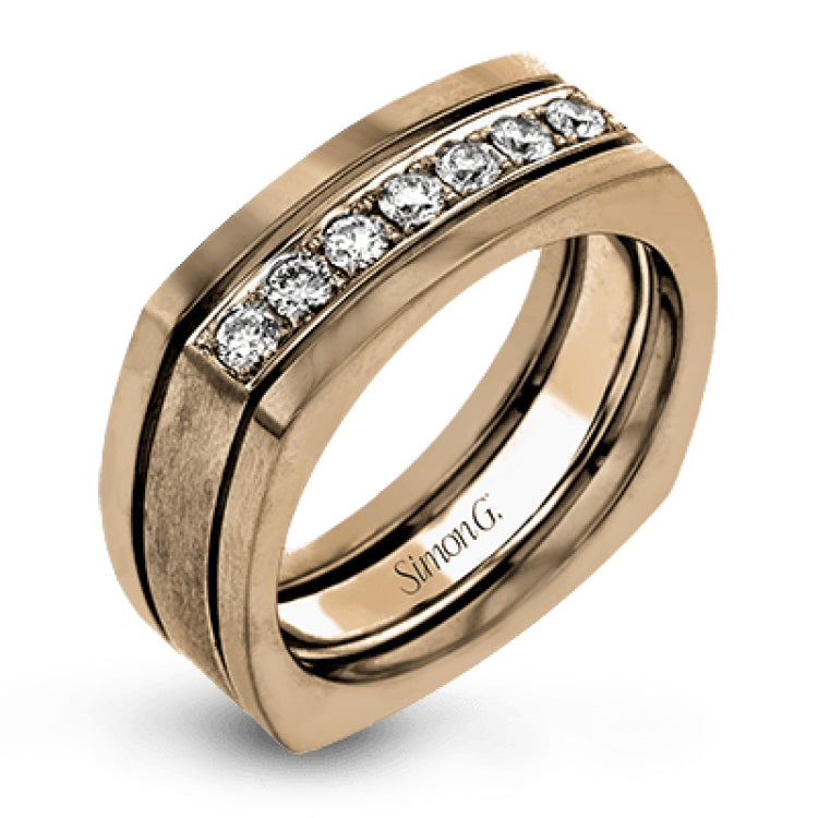 This statement men's band features a two-tone 14k gold design with yellow gold along the outside and white gold on the inside set with a line of .41 ctw white diamonds.