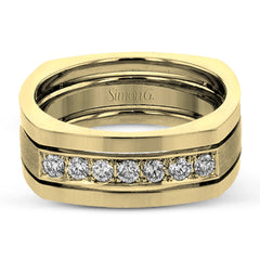 This statement men's band features a two-tone 14k gold design with yellow gold along the outside and white gold on the inside set with a line of .41 ctw white diamonds.