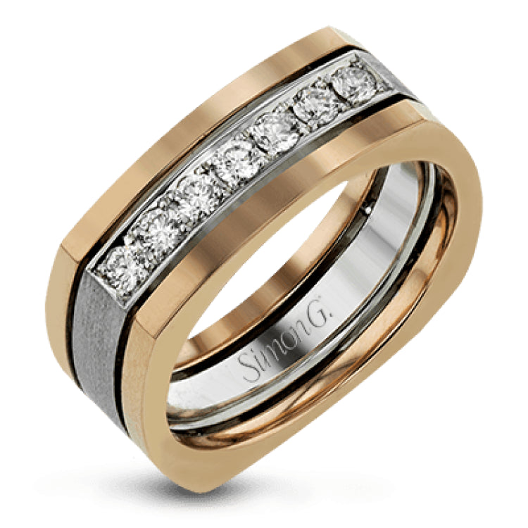 This statement men's band features a two-tone 14k gold design with yellow gold along the outside and white gold on the inside set with a line of .41 ctw white diamonds.