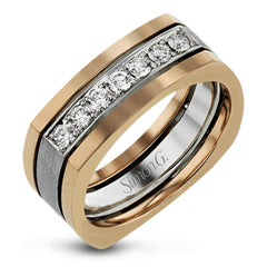 This statement men's band features a two-tone 14k gold design with yellow gold along the outside and white gold on the inside set with a line of .41 ctw white diamonds.