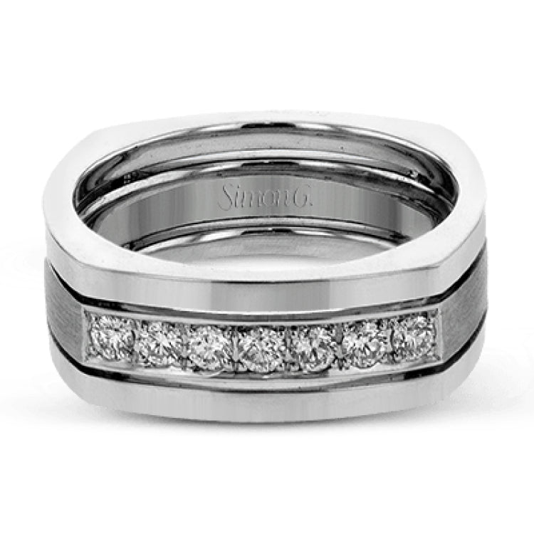 This statement men's band features a two-tone 14k gold design with yellow gold along the outside and white gold on the inside set with a line of .41 ctw white diamonds.