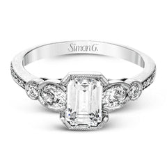 This lovely contemporary design features white gold and .16 ctw of round white diamonds and .39 ctw of oval shaped white diamonds as well as delicate milgrain edging around its centerpiece.