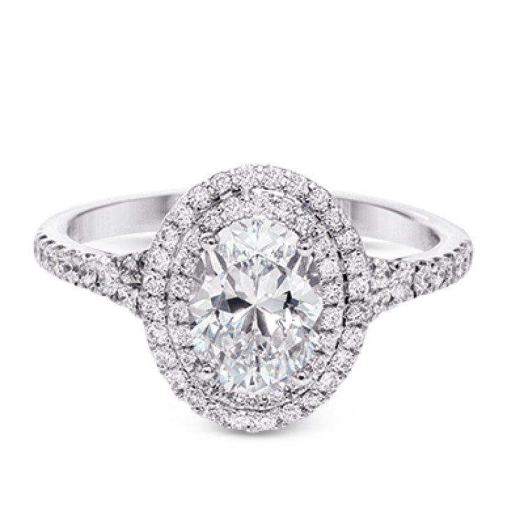 This beautiful, classic style setting features a double halo design built for an oval center stone. It contains .40 ctw of side diamonds.