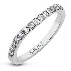 This beautiful, classic style setting features a double halo design built for an oval center stone. It contains .40 ctw of side diamonds.
