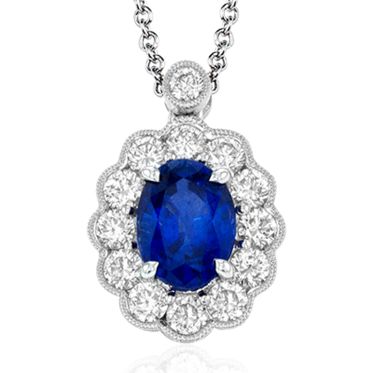 A classic design in 18k white gold, this pendant features a oval 1.24 ct sapphire center stone.