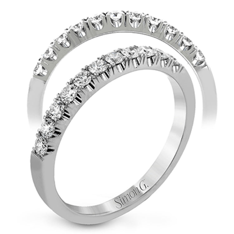 This classic wedding band contains a stunning .50 ctw of white round diamonds