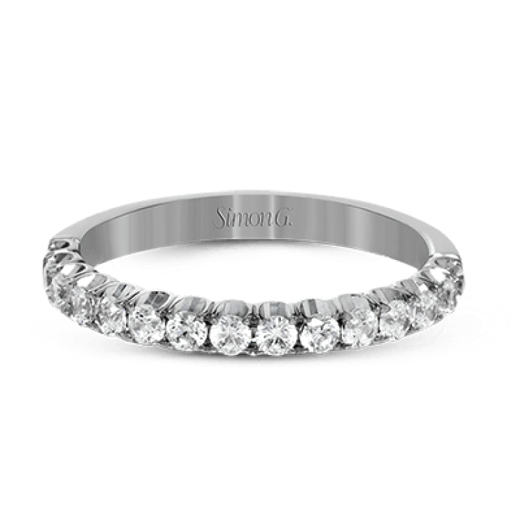 This classic wedding band contains a stunning .50 ctw of white round diamonds