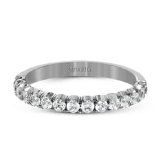 This classic wedding band contains a stunning .50 ctw of white round diamonds
