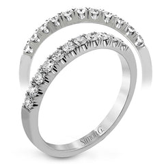 This classic wedding band contains a stunning .50 ctw of white round diamonds