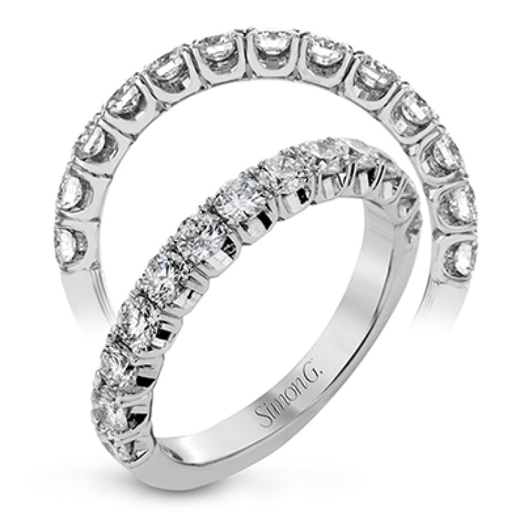 This classic wedding band contains a stunning 1.00 ctw of white round diamonds