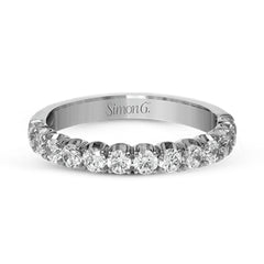 This classic wedding band contains a stunning 1.00 ctw of white round diamonds