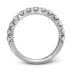 This classic wedding band features a distinctive setting style that shows off the 1.00 ctw of white diamonds to their full advantage.