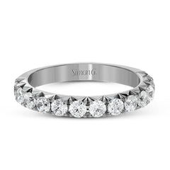 This band pairs perfectly with an engagement ring, or can be worn on its own or stacked with other rings. It contains .75 ctw of white diamonds.