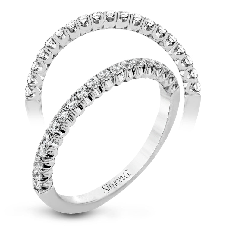 This classic wedding band contains a stunning .35 ctw of white round diamonds