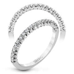This classic wedding band contains a stunning .35 ctw of white round diamonds