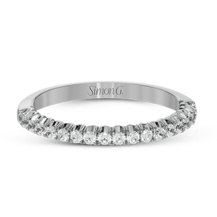 This classic wedding band contains a stunning .35 ctw of white round diamonds