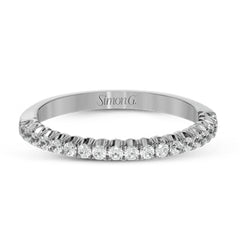 This classic wedding band contains a stunning .35 ctw of white round diamonds
