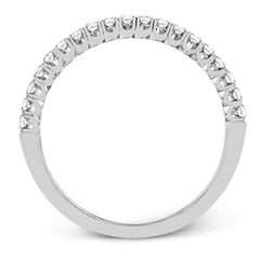 This classic wedding band contains a stunning .35 ctw of white round diamonds
