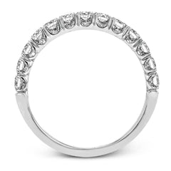 This classic wedding band contains a stunning .75 ctw of white round diamonds