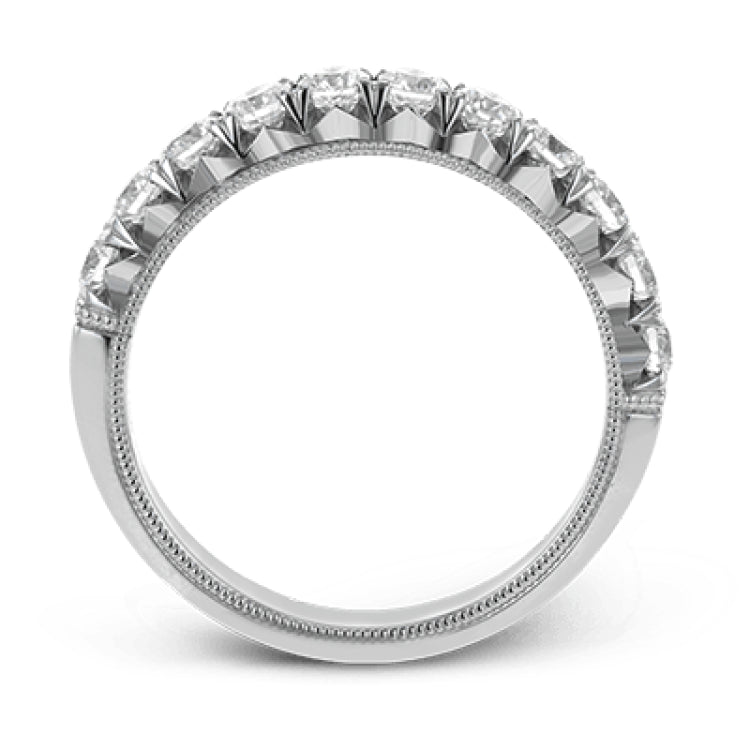 This classic wedding band features a distinctive setting style that shows off the .75 ctw of white diamonds to their full advantage.
