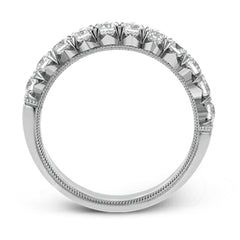 This classic wedding band features a distinctive setting style that shows off the .75 ctw of white diamonds to their full advantage.
