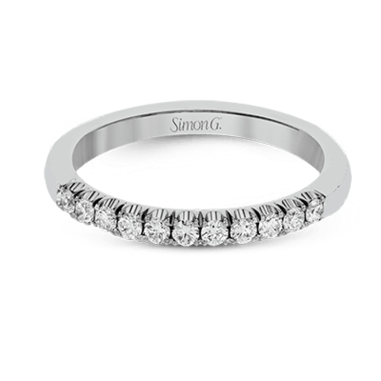 This classic wedding band features a distinctive setting style that shows off the .35 ctw of white diamonds to their full advantage.