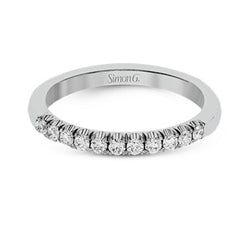 This classic wedding band features a distinctive setting style that shows off the .35 ctw of white diamonds to their full advantage.