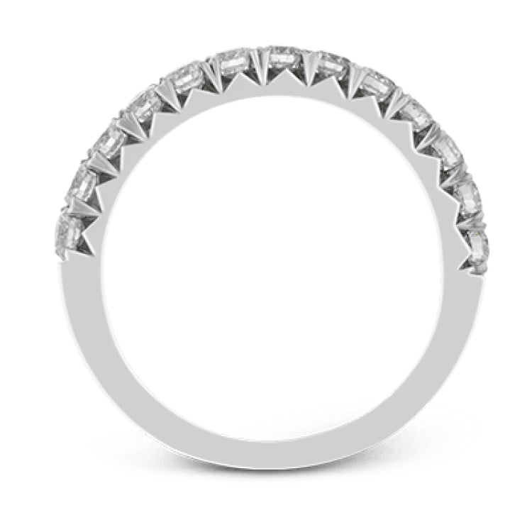 This band pairs perfectly with an engagement ring, or can be worn on its own or stacked with other rings. It contains .50 ctw of white diamonds.