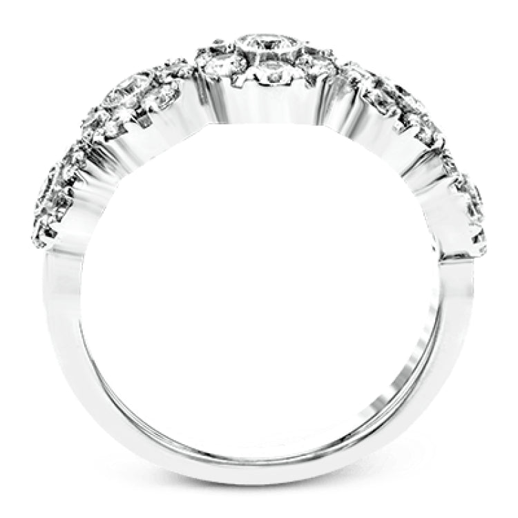 This whimsical white gold ring features .78 ctw of round white diamonds accentuated by .07 ctw of round pink diamonds as well as rose gold details in a playful floral design.