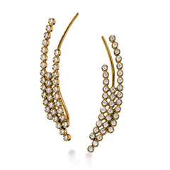 These fashionable climber earrings contain a stunning .62 ctw of white diamonds bezel set into a modern 18k gold design.