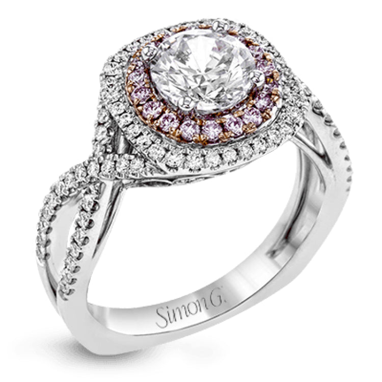 This lovely halo engagement ring is crafted in tones of 18k rose and white gold and contains .36 ctw of white diamonds along with .18 ctw of pink diamonds.