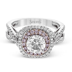 This lovely halo engagement ring is crafted in tones of 18k rose and white gold and contains .36 ctw of white diamonds along with .18 ctw of pink diamonds.