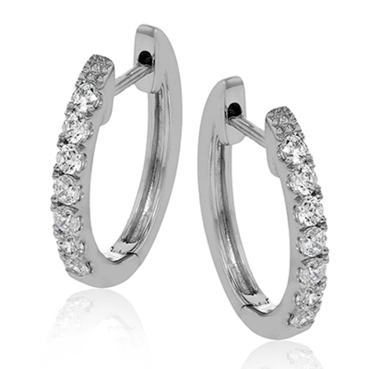 These classic 18k white gold hoop earrings would be perfect to wear every day, set with .39 ctw of white diamonds.