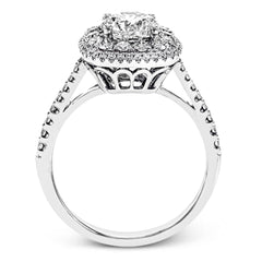 This 18k white gold engagement ring setting has a stunning double halo design set with .61 ctw of shining white round brilliant diamonds.