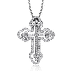 This cross pendant has a little something different to its design with a movable outline and center section, all made from 18k white gold. The pendant is set with .88 ctw of white diamonds.