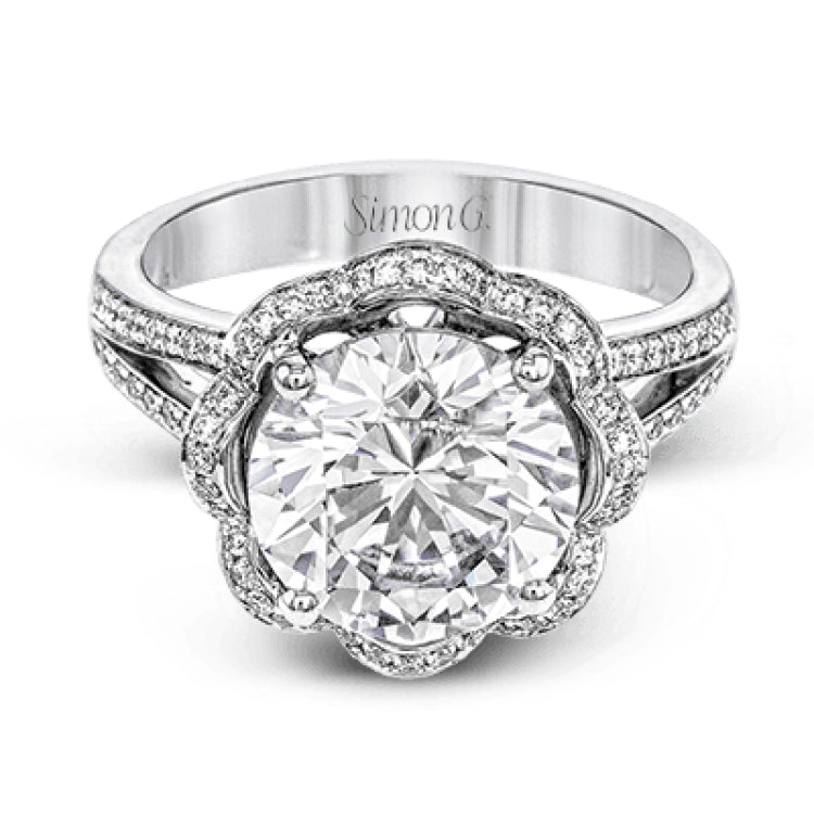 This lovely 18k white gold engagment setting features a wavy halo reminiscent of an opening flower set with .50 ctw of white diamonds.