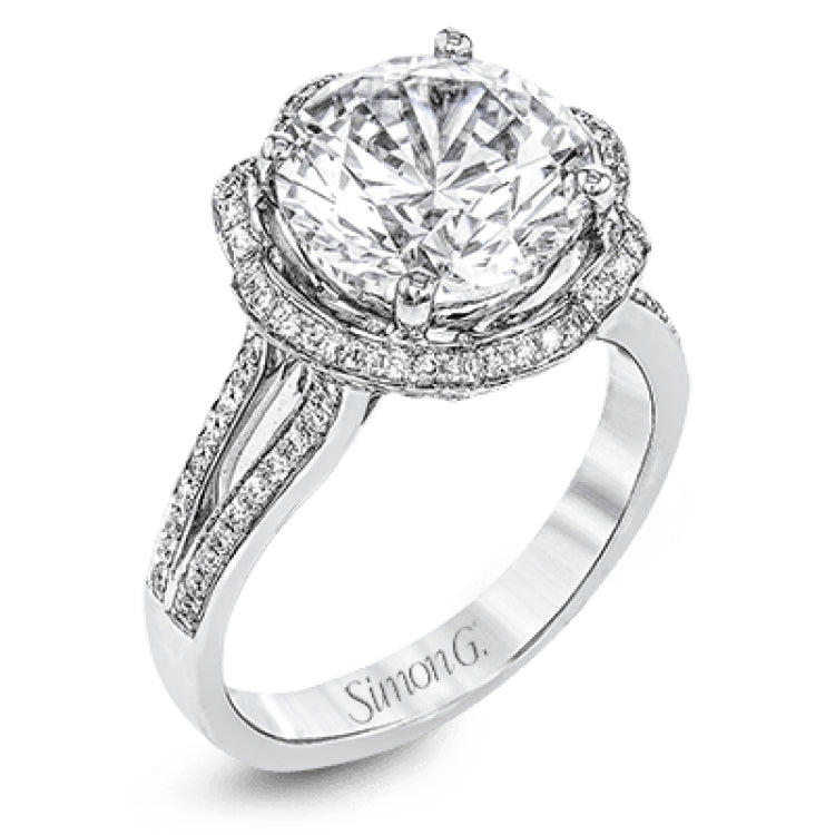 This lovely 18k white gold engagment setting features a wavy halo reminiscent of an opening flower set with .50 ctw of white diamonds.