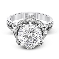 This lovely 18k white gold engagment setting features a wavy halo reminiscent of an opening flower set with .50 ctw of white diamonds.