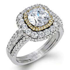 This bold design combines tones of pink and white with 1.11 ctw of sparkling white diamonds in 18k white gold complimenting .07 ctw of pink diamonds in 18k rose gold.
