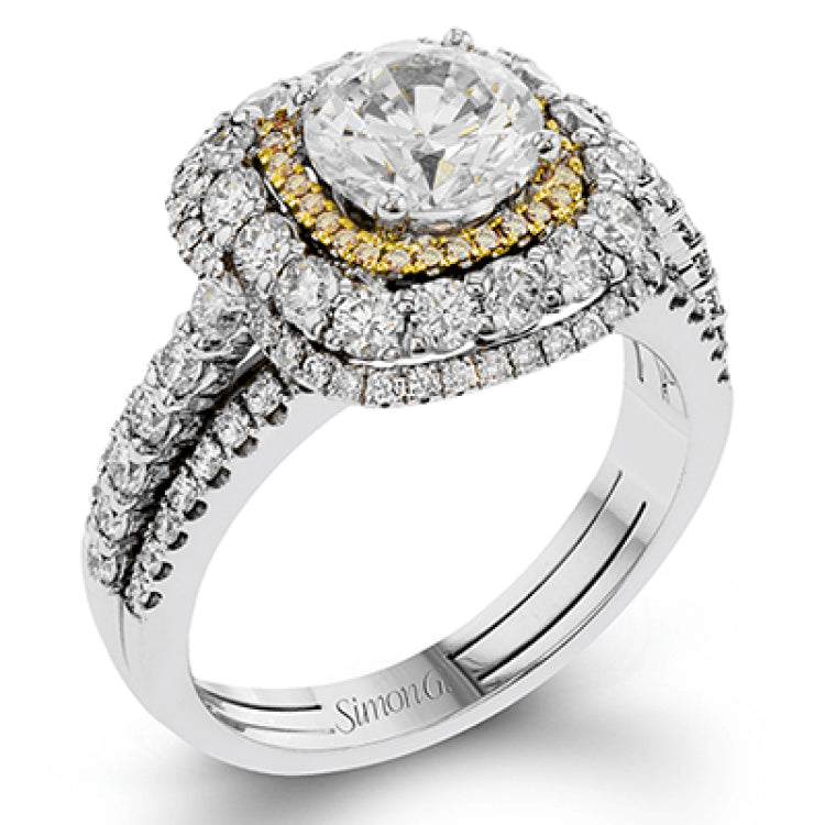 This bold design combines tones of pink and white with 1.11 ctw of sparkling white diamonds in 18k white gold complimenting .07 ctw of pink diamonds in 18k rose gold.