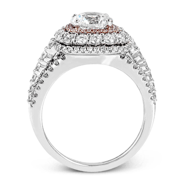 This bold design combines tones of pink and white with 1.11 ctw of sparkling white diamonds in 18k white gold complimenting .07 ctw of pink diamonds in 18k rose gold.