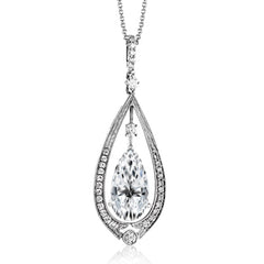 Elegant and teardrop shaped, this exquisite pendant centers around 2.47 ct green tourmaline stone which is accented by .32 ctw of white diamonds.