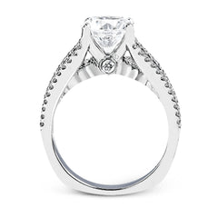 This 18k white gold engagment ring is a modern take on a classic design with 1.12 ctw of round white diamonds.