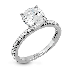 This beautiful 18k white gold wedding set contains a stunning .75 ctw of white round brilliant diamonds.