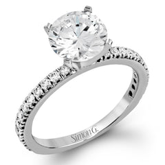 This beautiful 18k white gold wedding set contains a stunning .75 ctw of white round brilliant diamonds.