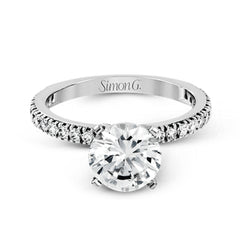 This beautiful 18k white gold wedding set contains a stunning .75 ctw of white round brilliant diamonds.