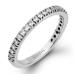 This beautiful 18k white gold wedding set contains a stunning .75 ctw of white round brilliant diamonds.