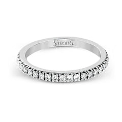 This beautiful 18k white gold wedding set contains a stunning .75 ctw of white round brilliant diamonds.