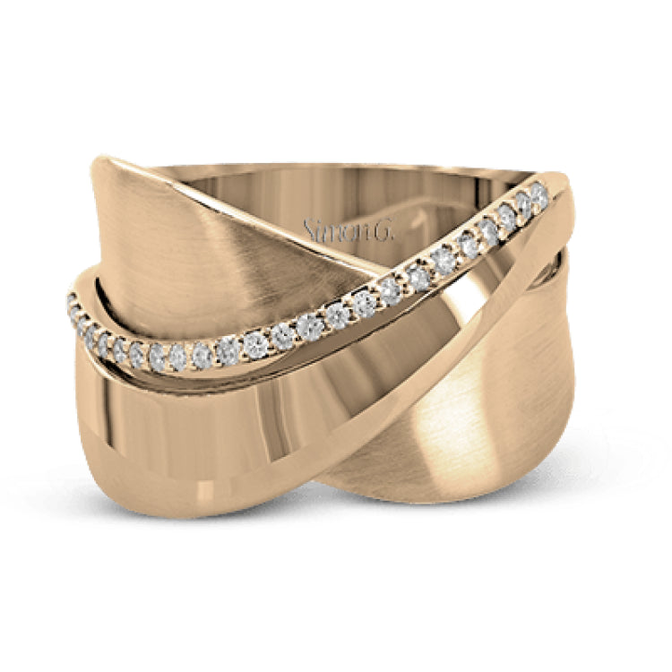 18k rose and white gold combine in this modern, overlapping band, accented by .12 ctw of white round brilliant diamonds.